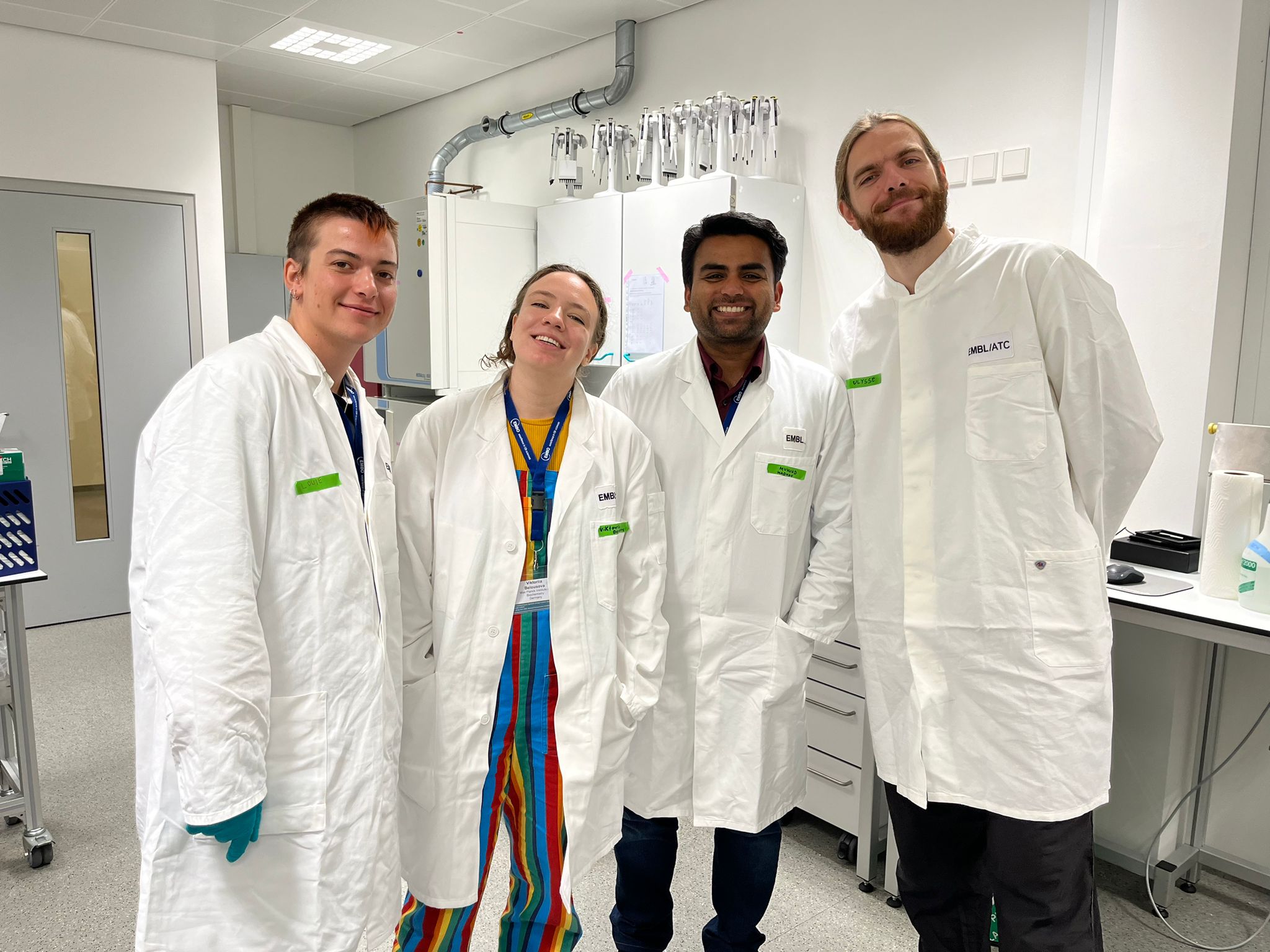 Louie in a lab coat at EMBL